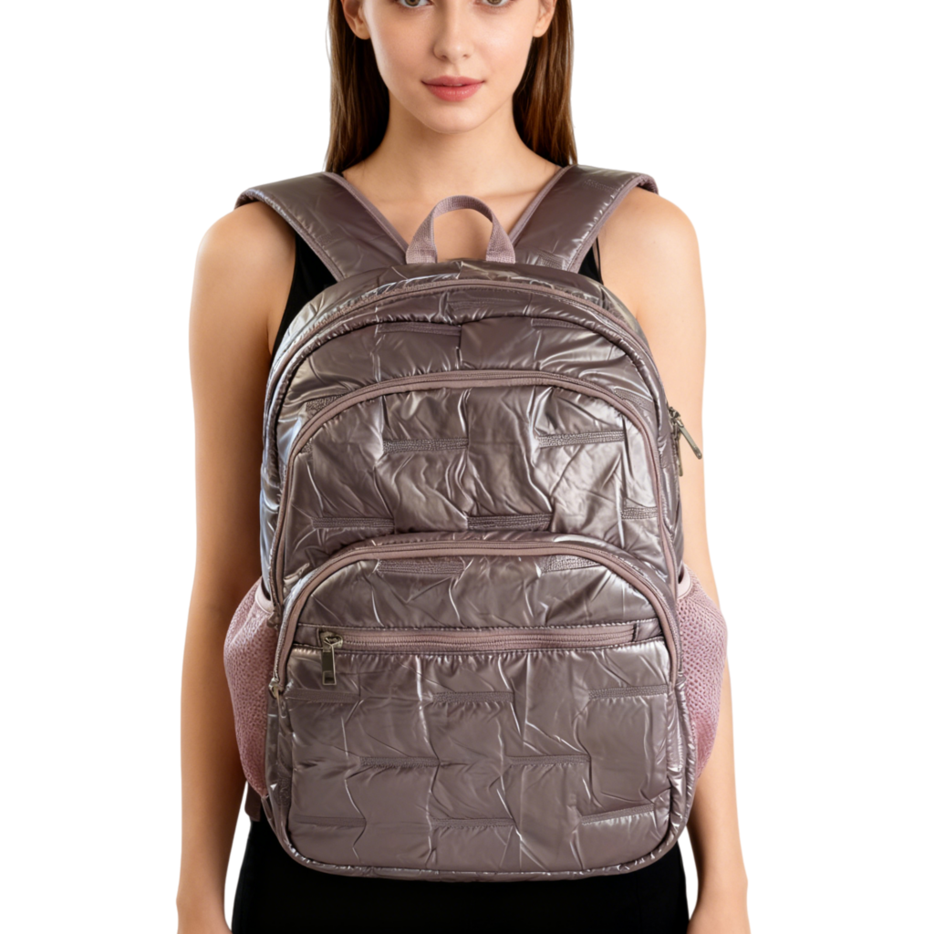 Side view of the backpack showing its sleek profile and quilted texture